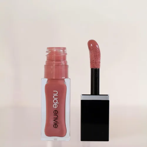 Vista 17 de nude envie - Brillo de labios - Acabado de alto brillo - Hidratante y fácil aplicación - Hidratación de lujo - Fórmula antiadherente - Con vitamina