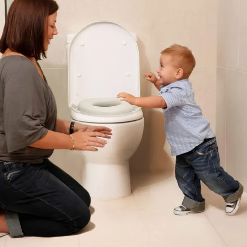 Vista 5 de Dreambaby Asiento de inodoro para orinal, acolchado suave con asas de agarre, color blanco, modelo L674