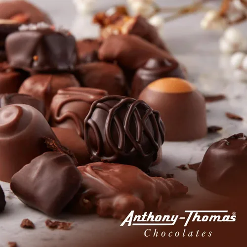Vista 2 de Anthony Thomas, Melt-A-Way Mints, chocolate con leche cremoso, mentas derretidas, chocolate cremoso batido con centros de menta