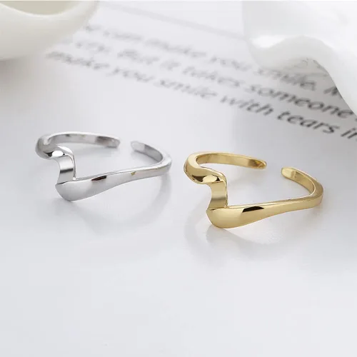 Vista 2 de Anillos sencillos y delicados para mujeres y hombres ajustadores para anillos sueltos anillo giratorio entrelazado de alto pulido anillo de banda