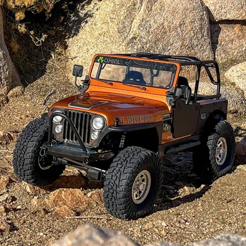 Vista 4 de Axial 1/10 SCX10 III Jeep CJ-7 4X4 RTR cepillado RC Rock Crawler, cobre