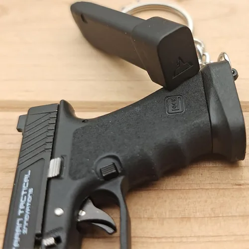 Vista 4 de Mini llavero de pistola, llavero con forma de pistola, llavero táctico pequeño regalo modelo de pistola, llaveros geniales para hombres
