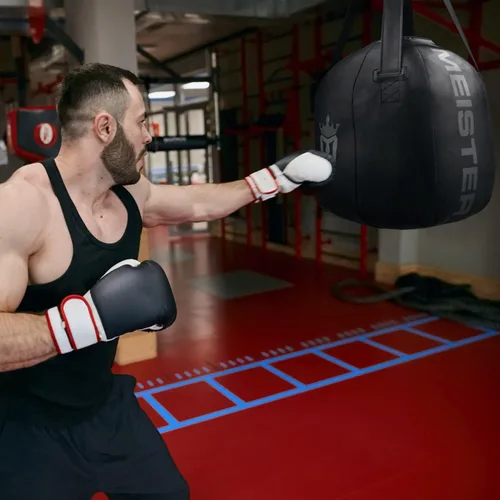 Vista 7 de Meister Bolsa pesada de bola de demolición llena de 60 libras para boxeo y MMA - Negro