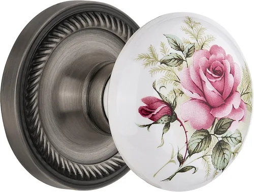 Vista 8 de Nostalgic Warehouse 711306, Mortaja de 2.25 pulgadas, roseta de cuerda de latón antiguo con perilla de porcelana rosa blanca