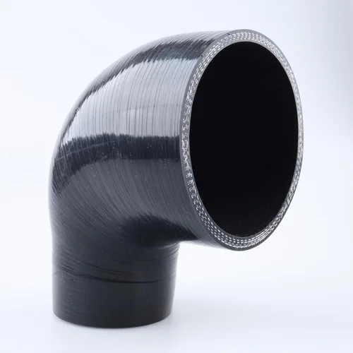 Vista 32 de AC PERFORMANCE ID de 1.35" a 1-3/16" (35 mm a 30 mm), acoplador reductor de codo de 90 grados, longitud de la pierna 3.5" (90 mm), reforzado de 3