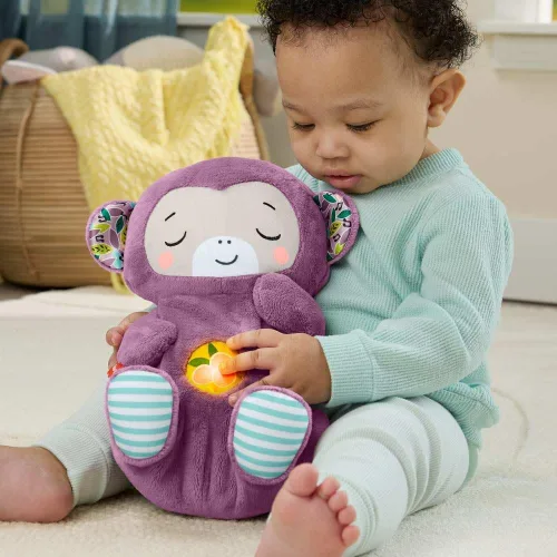 Vista 2 de Fisher-Price Juguetes para bebés Soothe ‘n Snuggle Mono púrpura de peluche máquina de sonido portátil con movimiento de respiración y luces