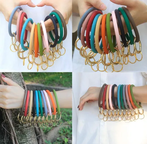 Vista 7 de YAKA Llavero de muñeca de silicona Pulsera de círculo Brazalete de goma redondo Llavero titular