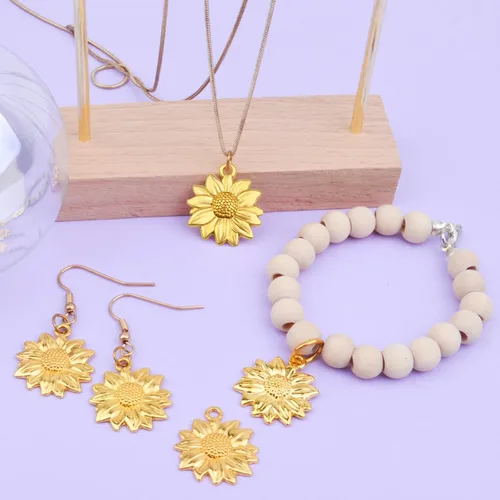 Vista 7 de BronaGrand 60pcs Sunflower Pendant Charms Alloy Sunflower Bead Charms Flower Charms Pendants Craft Supplies for DIY Jewelry Earrings Necklace
