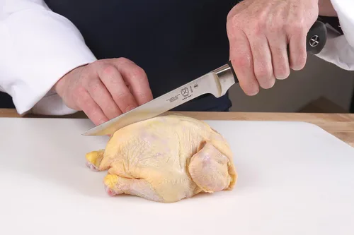 Vista 7 de Cuchillo para carne forjado Mercer Culinary Genesis de 10 pulgadas, Cuchillo rígido, forjado para deshuesar, 15,24 cm, 6", Acero/negro