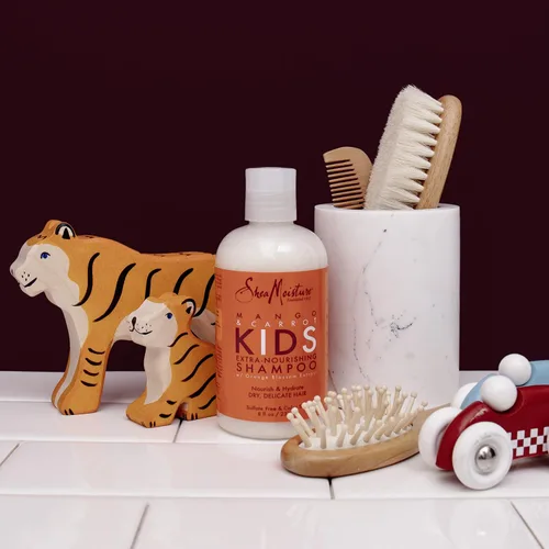 Vista 17 de SheaMoisture Champú extra nutritivo para el cuidado del cabello para niños Mango Zanahoria con manteca de karité 8 oz