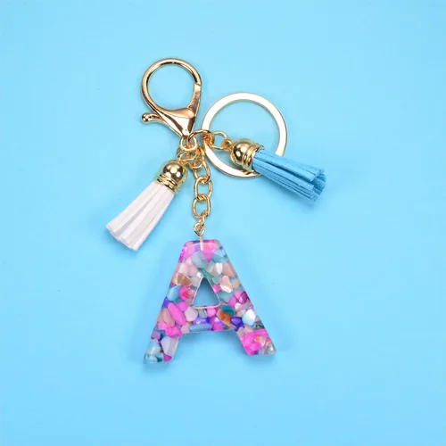 Vista 2 de Fario Llavero con letra inicial del alfabeto A-Z para mujer, colgante de borla, llavero para bolso, bolsos de mano para mujeres y niñas