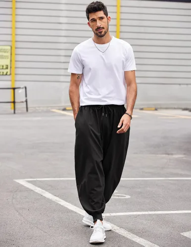 Vista 2 de COOFANDY Pantalones de harén hippie para hombre, holgados, de lino, bohemio, para yoga, casual, con entrepierna caída, pantalones
