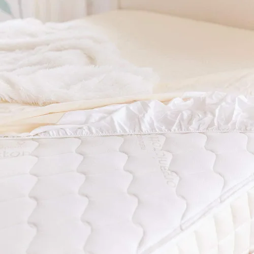 Vista 10 de Naturepedic Protector de colchón orgánico impermeable – Funda de colchón de punto elástico ajustable lavable y reutilizable – Almohadillas