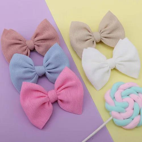 Vista 5 de YanJie Diademas de lazo de nailon de 4.5 pulgadas para niñas – Lazos atados hechos a mano para bebés y niños pequeños – 10 piezas