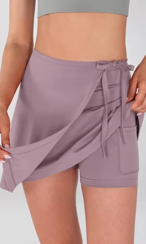 Vista 2 de ODODOS Falda pantalón envolvente para mujer, pantalones cortos integrados, faldas de tenis de cintura alta con bolsillos para golf atlético casual