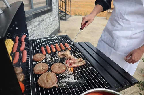 Vista 7 de Aleta de comida de 15 pulgadas, gancho giratorio de carne de acero inoxidable con mango de madera para asar y ahumar 1 paquete diestro