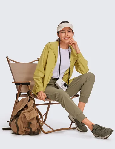 Vista 2 de CRZ YOGA Pantalones deportivos para mujer, impermeables, para exteriores, golf, atléticos, ligeros, con bolsillos con cremallera, de 27 pulgadas