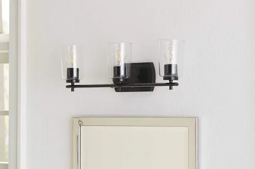 Vista 13 de Progress Lighting Adley Collection - Lámpara de tocador de baño tradicional con 3 luces, de cristal transparente, color negro mate, 7-5/8 x 23 Mate