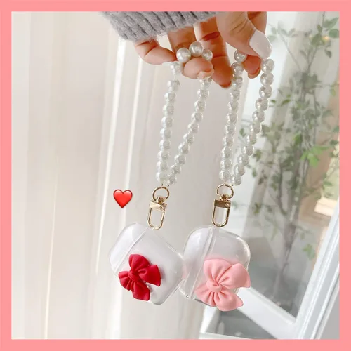 Vista 6 de Funda transparente compatible con AirPods 1 y 2, hermoso diseño de lazo colorido con pulsera de perlas de lujo, ultrafina, funda protectora de RosaA