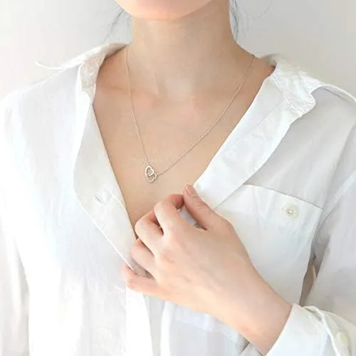 Vista 2 de Collar largo de amistad con dos corazones entrelazados para mujer