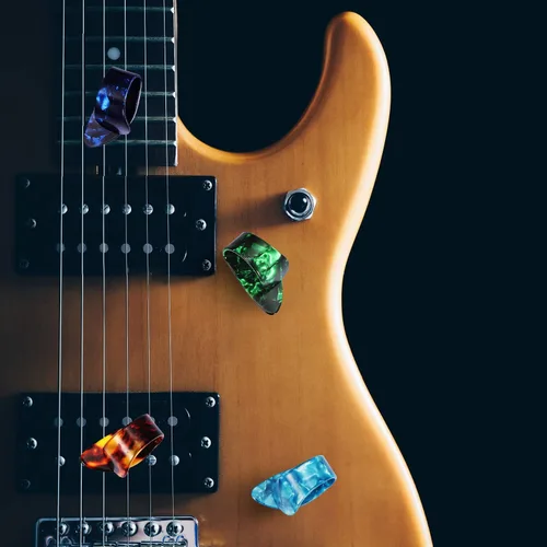 Vista 2 de Frienda Púas de dedo para pulgar, palillos planos, púas de guitarra de mano de celuloide