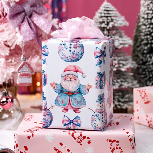 Vista 4 de Homeral Rollo de papel de regalo de Navidad, Papá Noel, muñeco de nieve y lazo y bastones de caramelo rosados, envoltura de regalo reversible