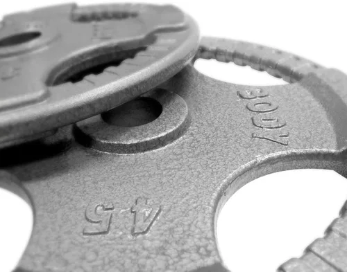 Vista 2 de Body-Solid Juego de discos olímpicos de hierro fundido con diseño de agarre cuádruple, pesas libres, placas de mancuernas, agujero estándar de 2