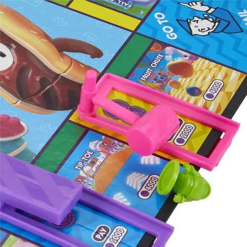 Vista 10 de Monopoly Fall Guys Ultimate Knockout Edition Juego de mesa para jugadores de 8 años en adelante, Dodge Interactive Obstáculos, incluye Troquel