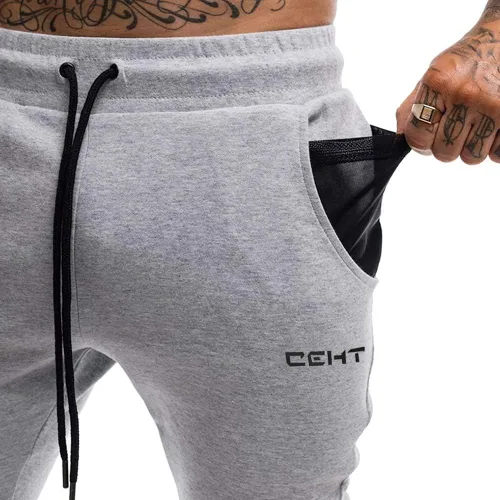 Vista 5 de Wangdo Pantalones deportivos ajustados para hombre, pantalones deportivos cónicos para entrenamiento, pantalones deportivos casuales para correr