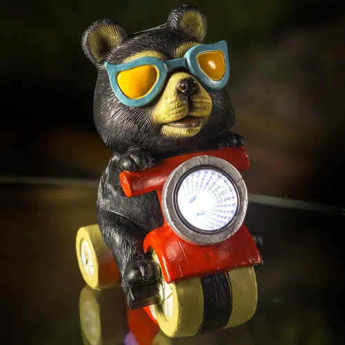 Vista 2 de Dawhud Direct Luz solar de oso motorista para decoración del hogar y al aire libre, luz LED parpadeante con energía solar de oso para decoración