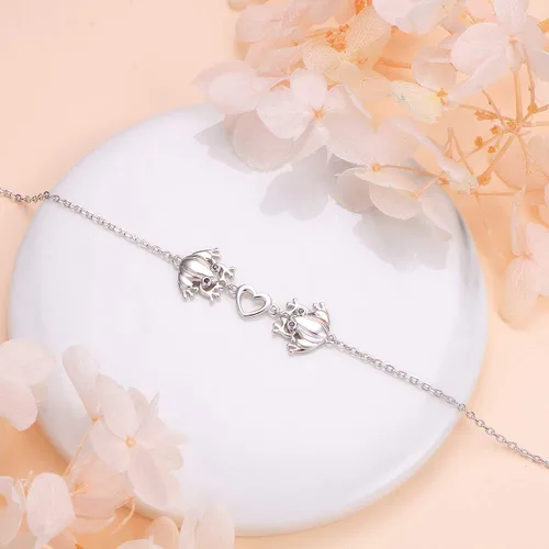 Vista 4 de Alphm Juego de joyas de plata de ley S925 con forma de corazón de rana, anillo y pulsera para mujeres y niñas