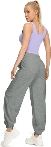 Vista 4 de icyzone Pantalones deportivos holgados de cintura alta con forro polar para mujer, pantalones gruesos y cómodos con bolsillos