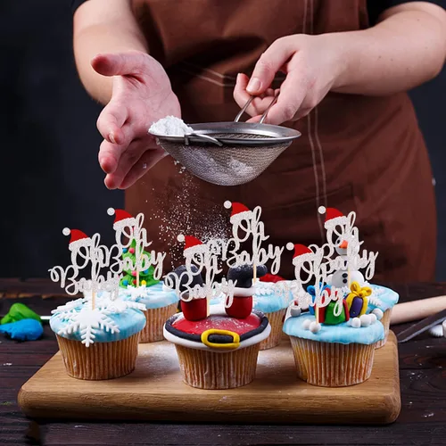 Vista 4 de Paquete de 24 Adornos Navideños Oh Baby para Cupcakes con Sombrero de Navidad con Purpurina, Palillos de Comida para Baby Shower para Niños y Niñas