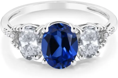 Vista 2 de Gem Stone King Anillo de compromiso de 3 piedras de topacio blanco y zafiro de oro blanco de 10 quilates para mujer