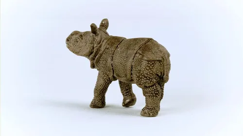 Vista 4 de Schleich Wild Life - Figura realista de rinoceronte indio para bebé, juguete auténtico y altamente detallado, duradero para educación y juego