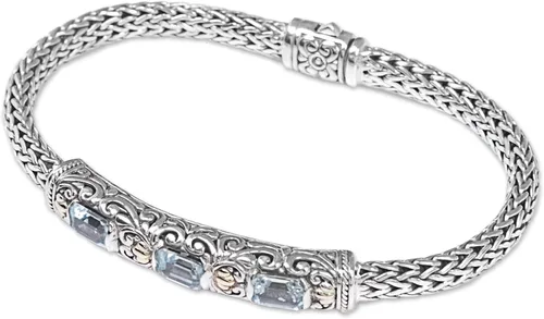 Vista 3 de NOVICA Pulsera trenzada artesanal de topacio azul con acento dorado y color vermeil de Bali Indonesia 1.8 pulgadas de largo x 0.3 pulgadas de ancho
