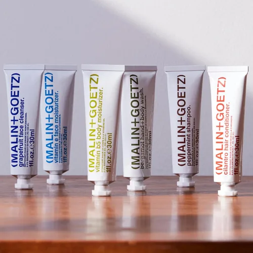 Vista 5 de Malin + Goetz Essentials - Kit de iniciación, juego de 6, 1 onza líquida, limpiador facial, humectante facial, gel de manos y cuerpo, hidratante