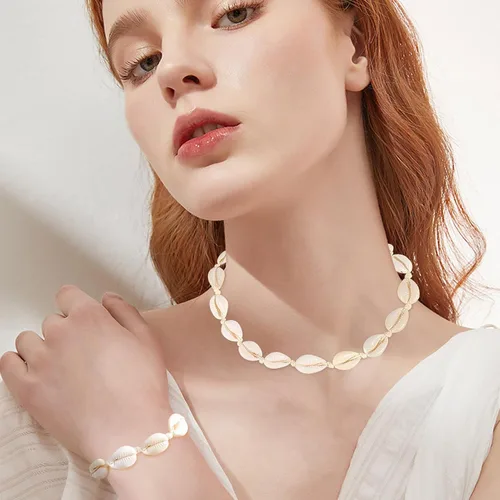 Vista 2 de Juego de collar y pulsera de concha natural para mujer, hecho a mano, gargantilla ajustable con concha natural