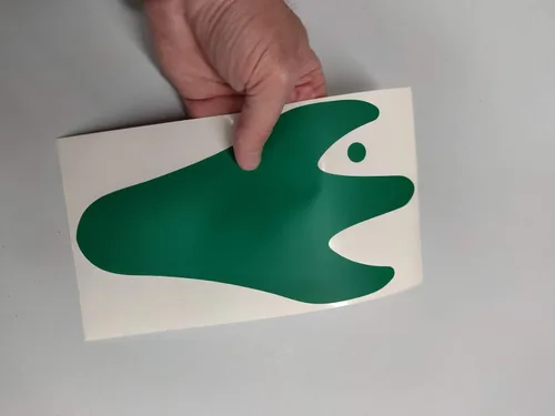 Vista 2 de LiteMark Calcomanías de huellas de dinosaurios extraíbles de 9 pulgadas, color verde, para paredes, paquete de 12