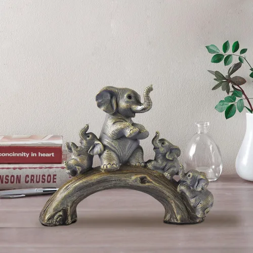 Vista 2 de Estatuas de elefante amarillo de buena suerte elefante jugando en el puente de troncos Elephant Family Figurine with 3 Calves on Log Bridge