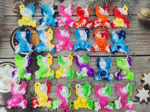Vista 2 de Paquete de 24 mini juguetes para ansiedad de rana a granel para niños y niñas, regalos de fiesta de cumpleaños y recompensas para estudiantes