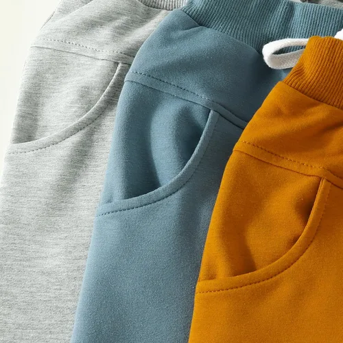 Vista 4 de Amiblvowa Paquete de 3 pantalones de otoño para bebés, niños y niñas, color sólido, pantalones deportivos para otoño e invierno