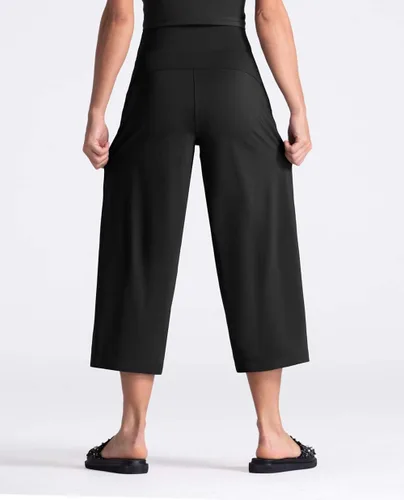 Vista 5 de THE GYM PEOPLE Bootleg - Pantalones capri de yoga para mujer, control de abdomen, cintura alta, pantalones cortos acampanados con bolsillos
