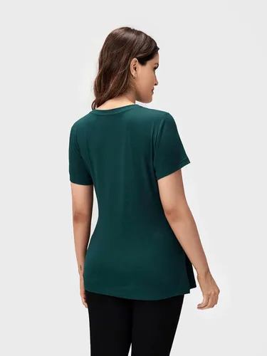 Vista 2 de OYOANGLE Camisetas básicas de maternidad para mujer, con lazo frontal, manga corta, cuello redondo, peplum
