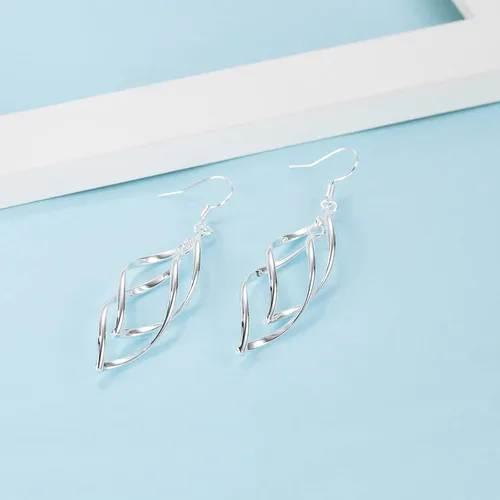 Vista 4 de Pendientes de alambre de espiral lineal chapados en oro de 18 quilates para mujer colgando Boho caída