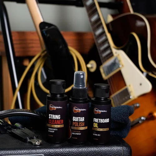Vista 2 de Kit de Limpieza y Pulido para Guitarra, Limpiador de Cuerdas, Enrollador y Aceite para Diapasón HECHO EN EE.UU. Aceite y Limpiador para Guitarra