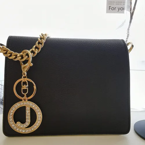 Vista 6 de Llaveros de letras para mujer, diamantes de imitación, inicial, regalo para niñas, dije de alfabeto de cristal de la A a la Z con llavero