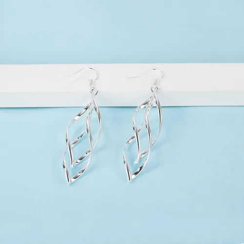 Vista 3 de Pendientes de alambre de espiral lineal chapados en oro de 18 quilates para mujer colgando Boho caída