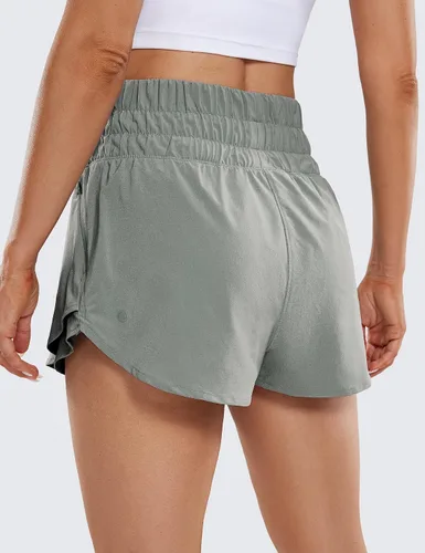Vista 2 de CRZ YOGA Pantalones cortos atléticos de cintura alta para mujer, falda con volantes, forro frontal, pantalones cortos de entrenamiento para correr