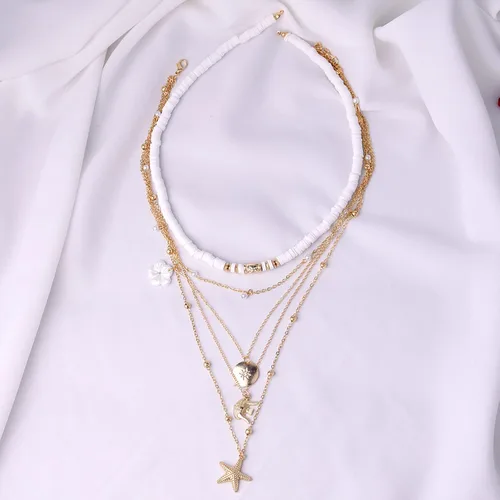 Vista 7 de HUASAI Puka - Collar para mujer, collar de concha de mar, collar de playa en capas para niñas, collar bohemio con estrellas de mar y estrellas